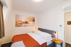 URBAN ISLAND - Riverside Apartments