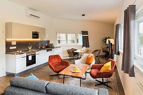 URBAN ISLAND - Riverside Apartments