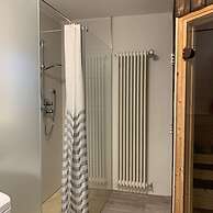 Holiday home with sauna and garden lounge