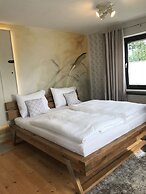 Holiday home with sauna and garden lounge