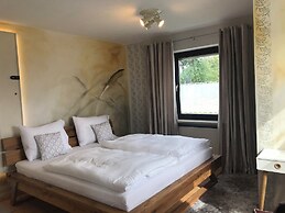 Holiday home with sauna and garden lounge