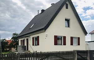 Holiday home with sauna and garden lounge