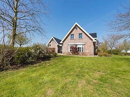 Farmhouse in Genderen With Terrace