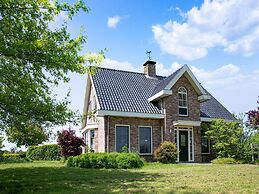 Farmhouse in Genderen With Terrace