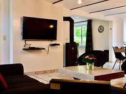 Tranquil Holiday Home in Manhay with Hot Tub near Ski Area