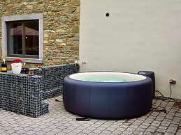 Tranquil Holiday Home in Manhay with Hot Tub near Ski Area