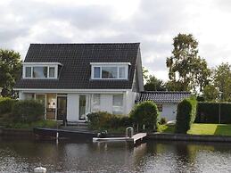 Detached House on the Water With Jetty in Langweer