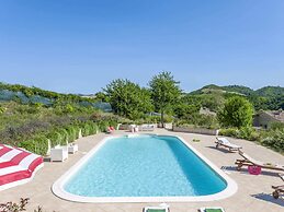 Belvilla by OYO Quaint Holiday Home With Pool