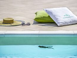 Belvilla by OYO Quaint Holiday Home With Pool