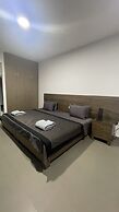 Grey Escape Apartements