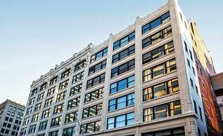 Contemporary 2BR 2BA Apartment In Downtown Indianapolis by CozySuites