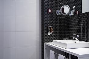 Petit Palace Lealtad Plaza