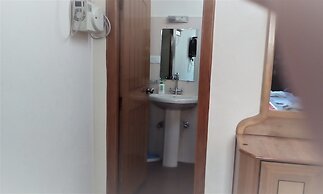 Hotel Ganesha Inn Ganga View