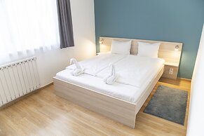 Corvin Plaza Apartments and Suites