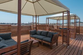 Corvin Plaza Apartments and Suites