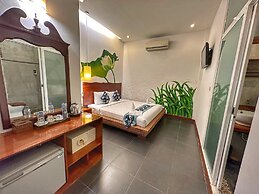 Monsoon Riverside Hotel