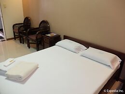 Rumi Apartelle Hotel