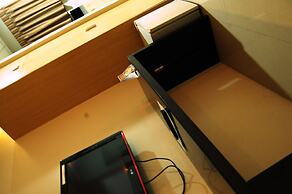 Rumi Apartelle Hotel