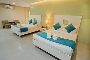 Holiday Suites Business District (Empire Suites Hotel)