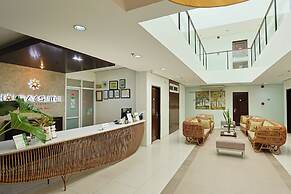 Holiday Suites Business District (Empire Suites Hotel)