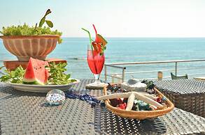 Belussi Beach Hotel & Suites