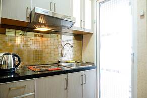 Furnished Studio with Comfortable Design Green Pramuka Apartment