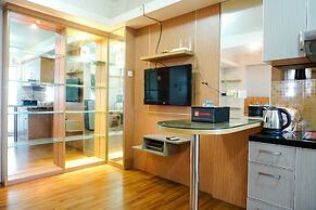 Furnished Studio with Comfortable Design Green Pramuka Apartment