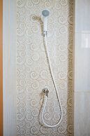 Simply Minimalist Studio at Green Park View Apartment