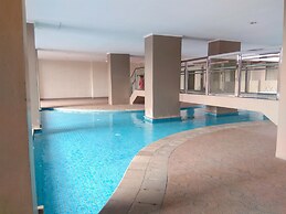 Minimalist 2BR Apartment at Green Park View