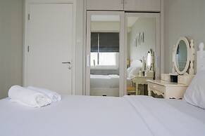 Elegant 1BR Parahyangan Residence Apartment With Mountain View