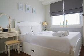 Elegant 1BR Parahyangan Residence Apartment With Mountain View