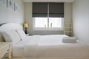 Elegant 1BR Parahyangan Residence Apartment With Mountain View