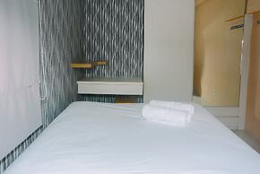 Minimalist 1BR with Pool View at Bassura City Apartment