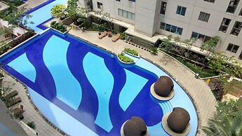 Minimalist 1BR with Pool View at Bassura City Apartment