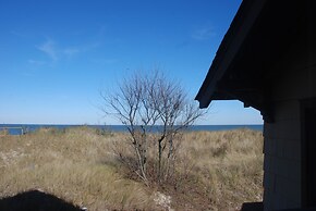 Rustic Rooftop Delight - Bay Front 2 Bedroom Apts by RedAwning