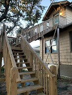 Rustic Rooftop Delight - Bay Front 2 Bedroom Apts by RedAwning