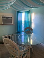 Rustic Rooftop Delight - Bay Front 2 Bedroom Apts by RedAwning