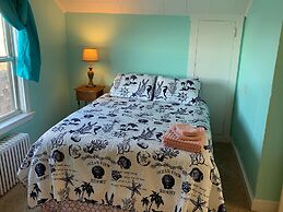 Rustic Rooftop Delight - Bay Front 2 Bedroom Apts by RedAwning