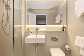 Orange Stay At Melbourne Quarter