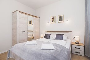 Apartment Plac na Groblach by Renters