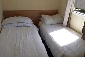 Caravan on Combe Haven - Sleeps 8 & Pet Friendly