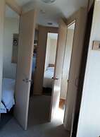 Caravan on Combe Haven - Sleeps 8 & Pet Friendly