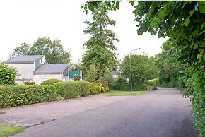 Nice Holiday Home in Quiet Park near Veerse Meer