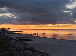 Seaside Serenity at Hasmark Beach-by Traum