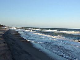 Seaside Serenity at Hasmark Beach-by Traum