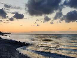 Seaside Serenity at Hasmark Beach-by Traum