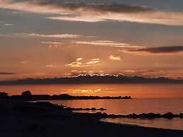 Seaside Serenity at Hasmark Beach-by Traum