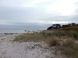 Seaside Serenity at Hasmark Beach-by Traum