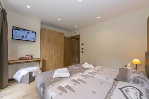 Casa Giardino Ski in - Ski out 100m