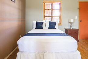 Capital O Hotel Villa Azura